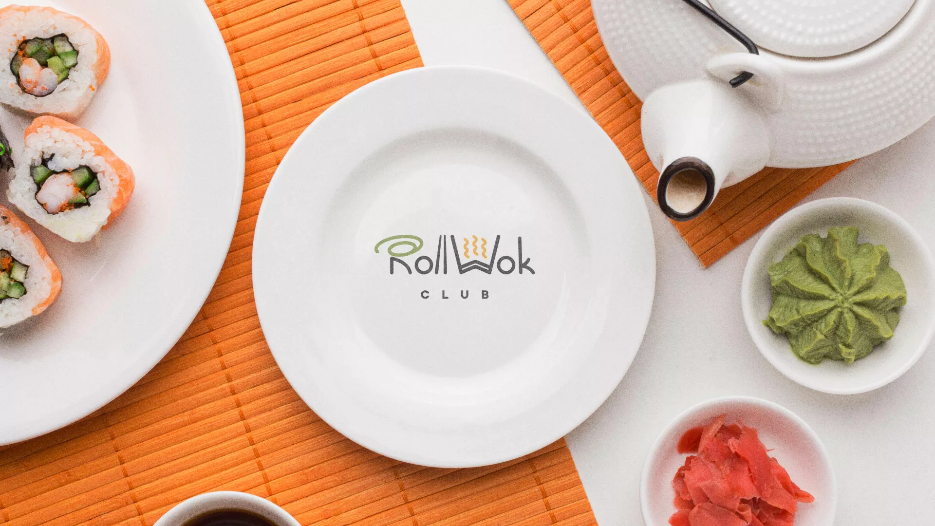 Разработка логотипа и фирменного стиля в Воткинске для суши-бара «Roll Wok Club» Разработка логотипа и фирменного стиля в Воткинске для суши-бара «Roll Wok Club»